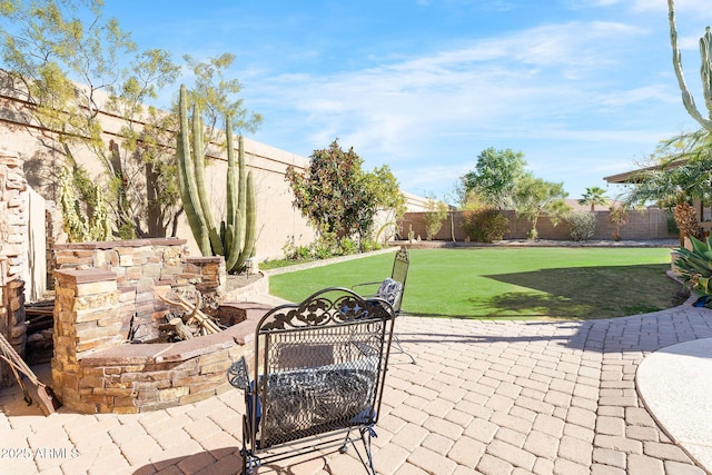 view of patio featuring a fire pit