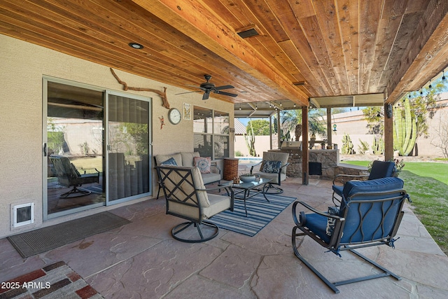 view of patio / terrace featuring ceiling fan and outdoor lounge area