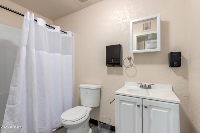 bathroom with toilet, visible vents, baseboards, vanity, and a shower with curtain