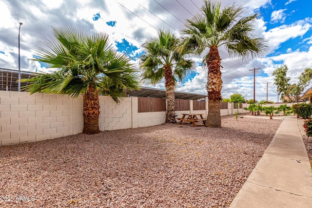 view of yard with fence