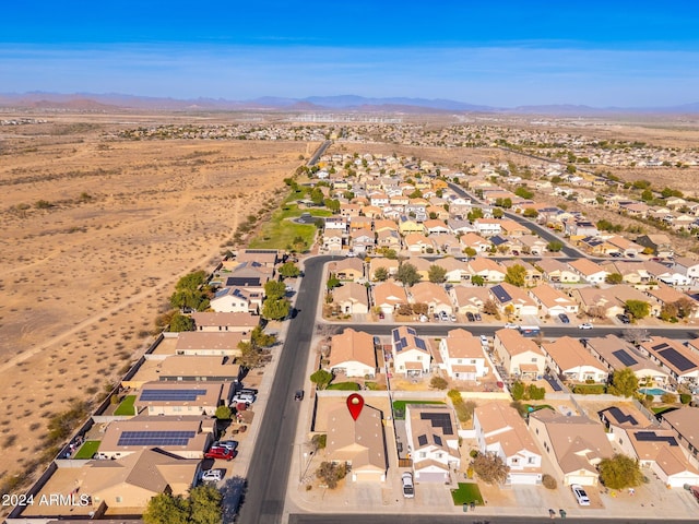 birds eye view of property featuring a mountain view