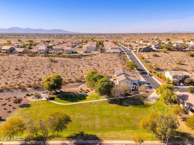 birds eye view of property featuring a mountain view