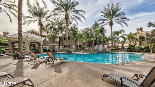 community pool featuring a patio