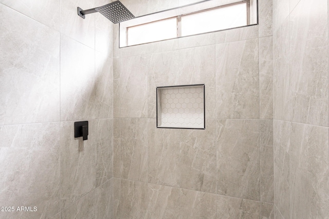 details with a tile shower