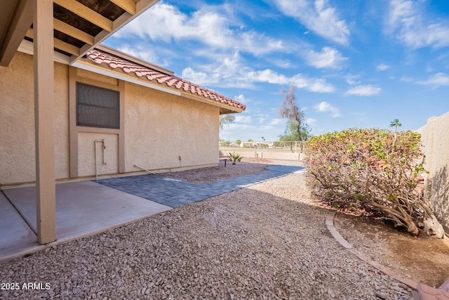 view of yard with a patio area and fence