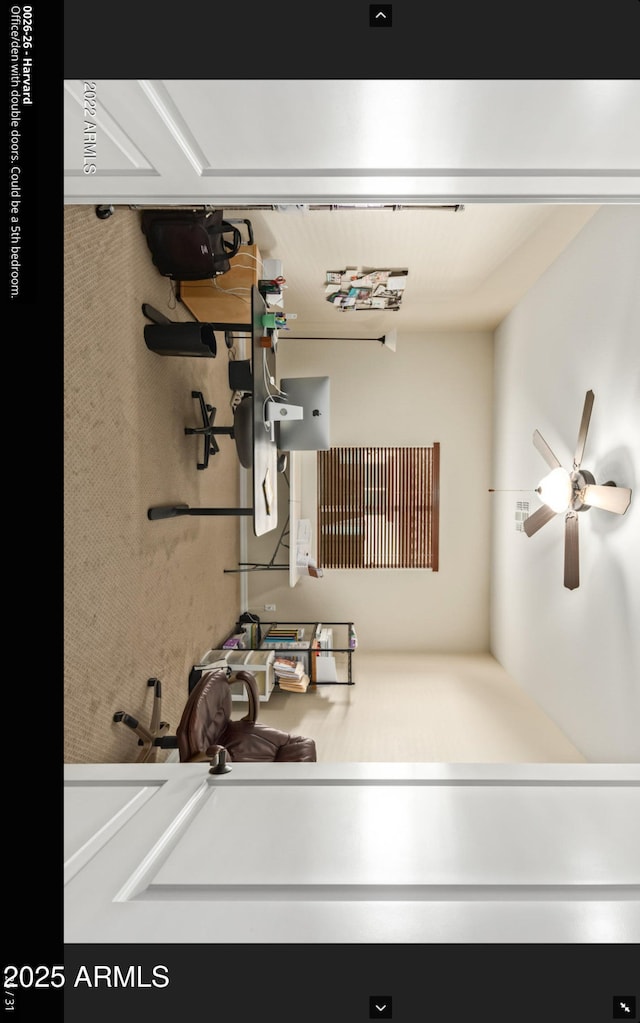 workout room with ceiling fan
