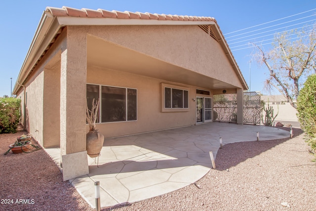 rear view of house with a patio area