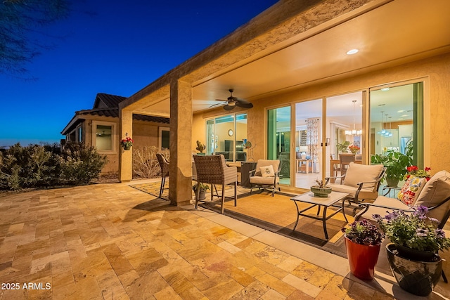 view of patio / terrace with a ceiling fan