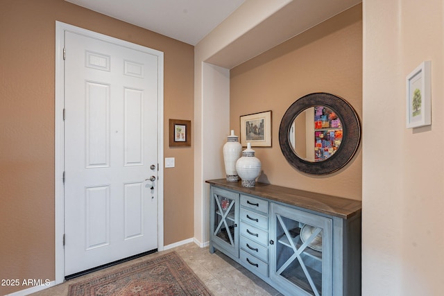 entrance foyer with baseboards