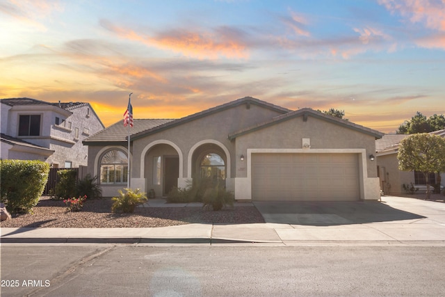 view of front of home with a garage