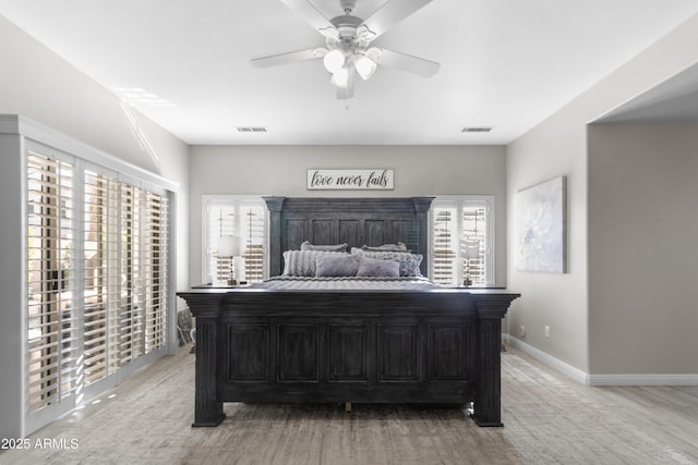 bedroom featuring ceiling fan and hardwood / wood-style floors