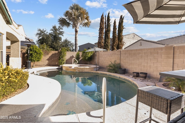 view of pool with an in ground hot tub and a patio