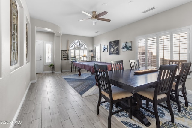 dining room featuring ceiling fan