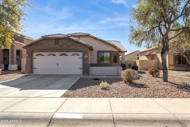 view of front of home with a garage