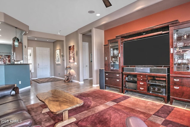 living room with dark tile patterned floors