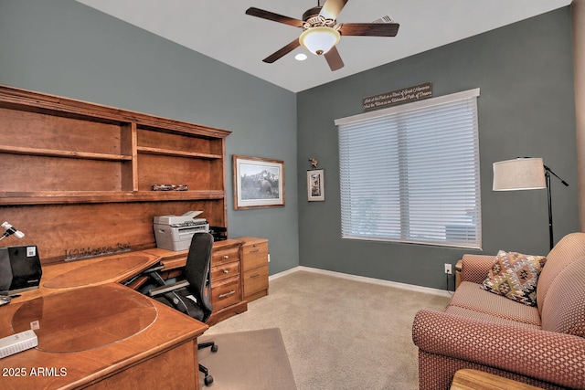 office space featuring light colored carpet and ceiling fan