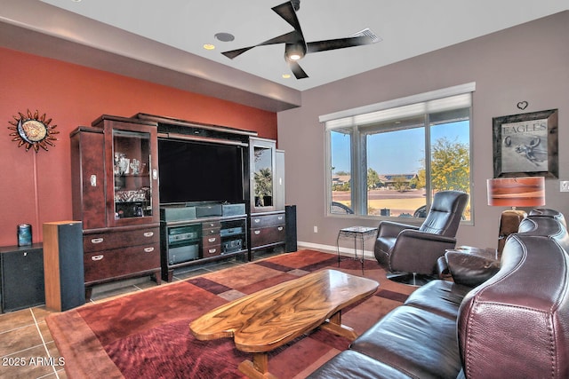 tiled living room featuring ceiling fan