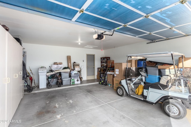 garage featuring a garage door opener