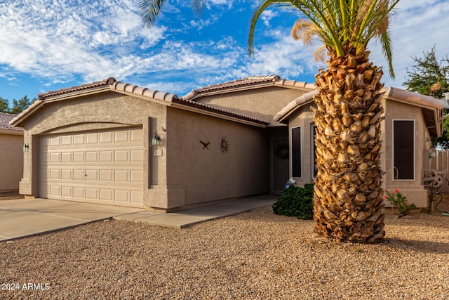 view of front of property featuring a garage