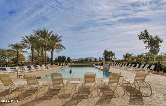 view of swimming pool featuring a patio