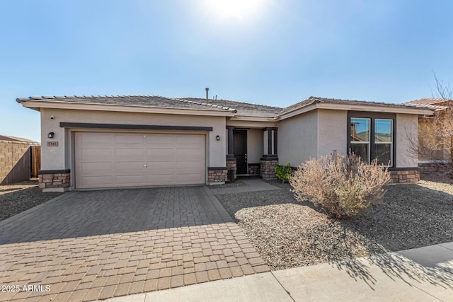 view of front of property with a garage