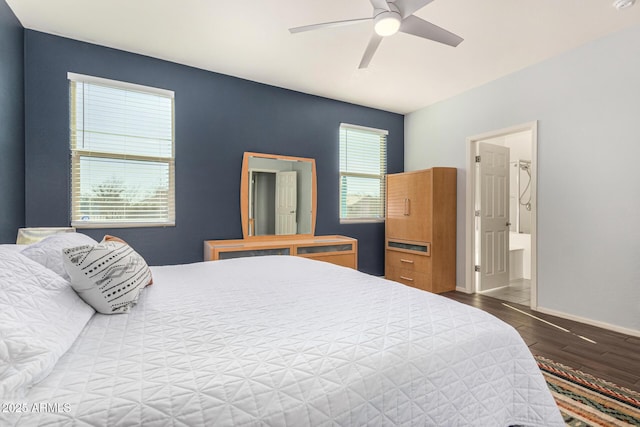 bedroom featuring wood-type flooring, ceiling fan, and ensuite bath