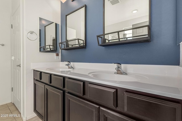 bathroom featuring vanity and tile patterned floors