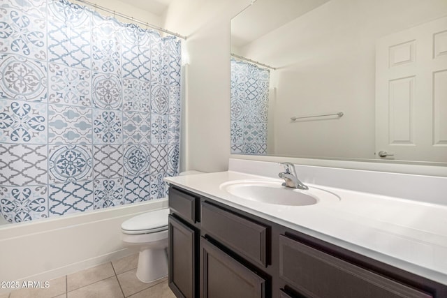 full bathroom with tile patterned flooring, vanity, shower / bathtub combination with curtain, and toilet