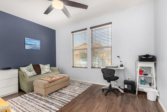 office area featuring dark wood-type flooring and ceiling fan