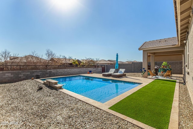 view of swimming pool featuring a patio