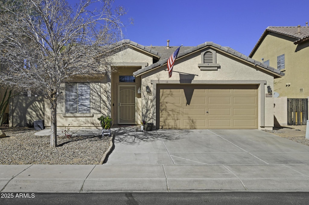 view of front of property featuring a garage