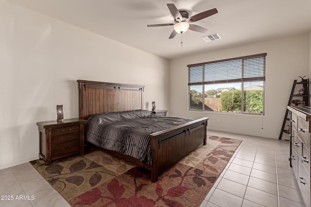 bedroom featuring ceiling fan and light tile patterned flooring