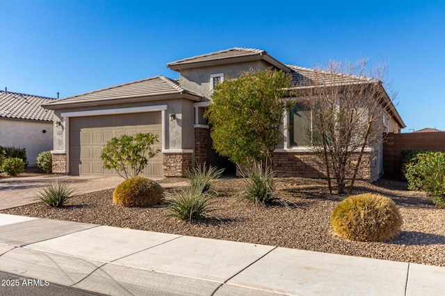 view of front of home with a garage