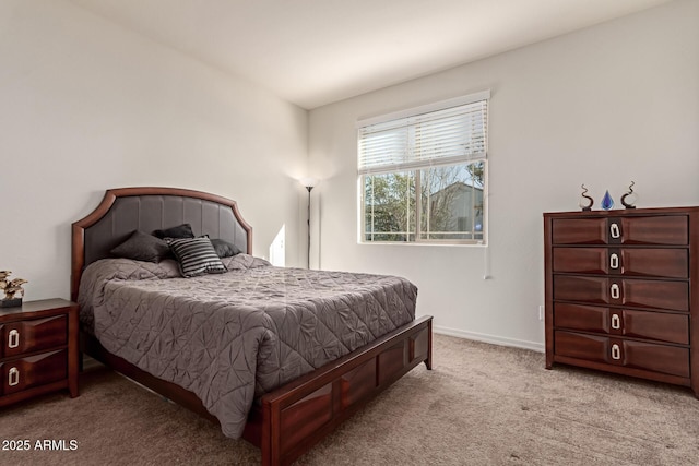 bedroom with light carpet