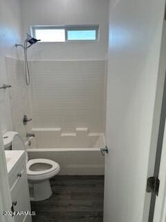 full bathroom with shower / bathing tub combination, a healthy amount of sunlight, vanity, and toilet