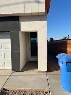 property entrance featuring a garage