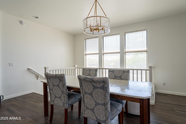 15221 N Clubgate Dr Unit 2132, Scottsdale, AZ 85254 - dining space with baseboards, dark wood-style floors, and an inviting chandelier