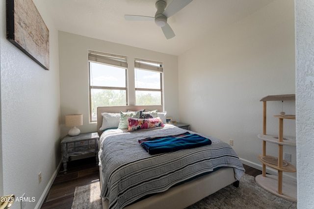 15221 N Clubgate Dr Unit 2132, Scottsdale, AZ 85254 - bedroom featuring baseboards, a ceiling fan, and wood finished floors