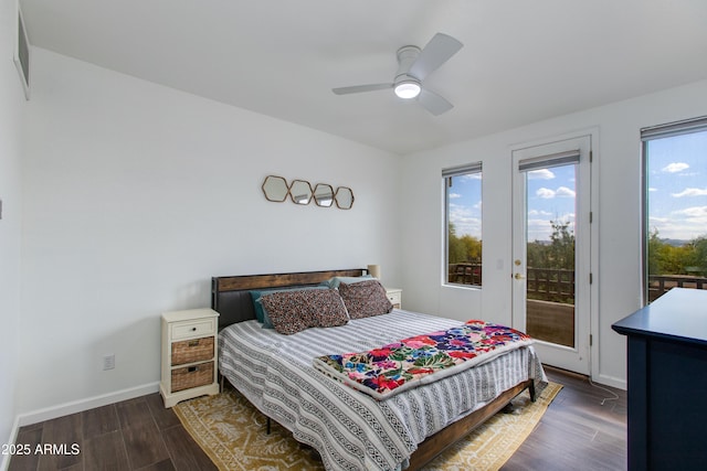 15221 N Clubgate Dr Unit 2132, Scottsdale, AZ 85254 - bedroom with dark wood finished floors, visible vents, a ceiling fan, baseboards, and access to outside