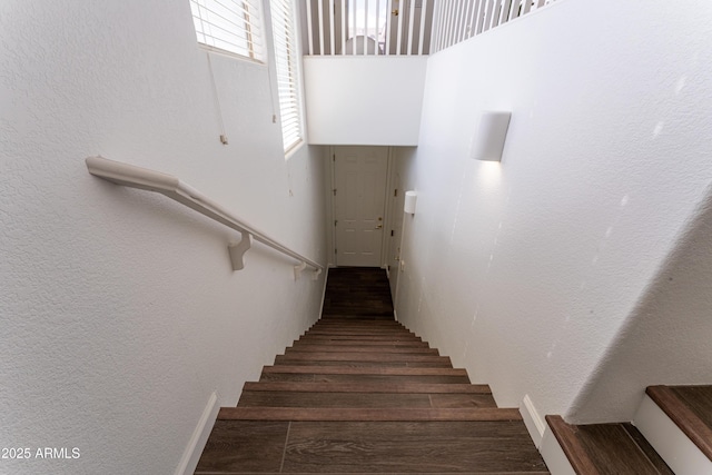 15221 N Clubgate Dr Unit 2132, Scottsdale, AZ 85254 - stairway with a textured wall and wood finished floors