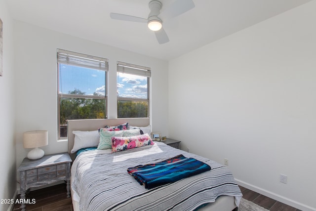 15221 N Clubgate Dr Unit 2132, Scottsdale, AZ 85254 - bedroom with wood finished floors, baseboards, and ceiling fan