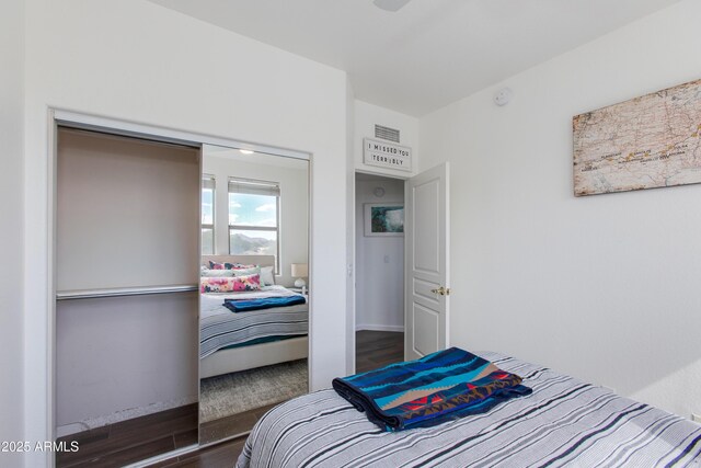 15221 N Clubgate Dr Unit 2132, Scottsdale, AZ 85254 - bedroom featuring wood finished floors and visible vents