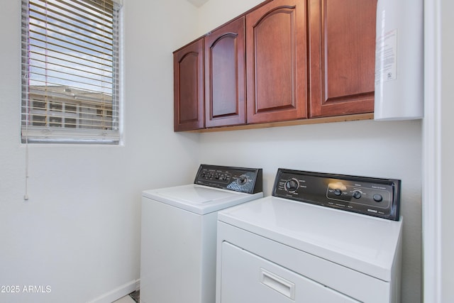 15221 N Clubgate Dr Unit 2132, Scottsdale, AZ 85254 - washroom with cabinet space, washing machine and dryer, and baseboards