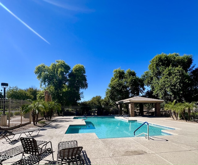 view of pool featuring a patio area