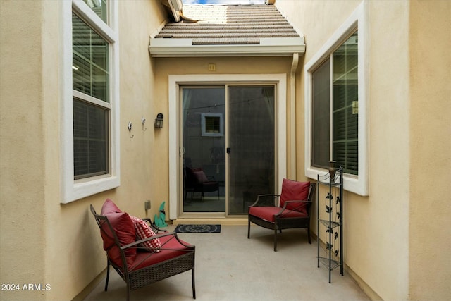 doorway to property featuring a patio area