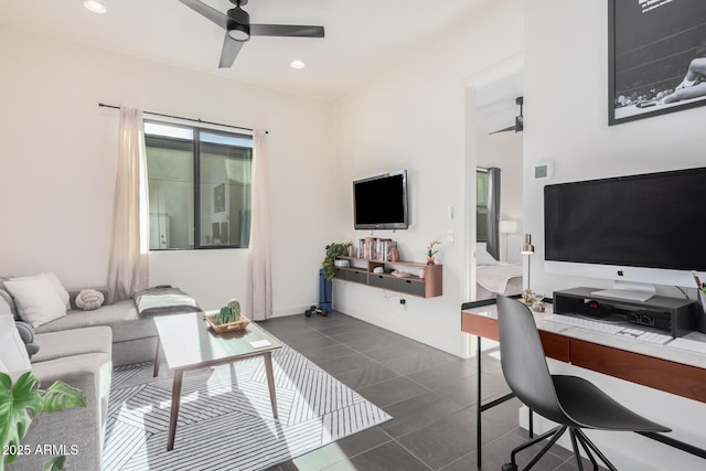 tiled living room featuring ceiling fan