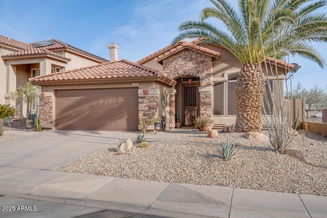 mediterranean / spanish-style home featuring a garage