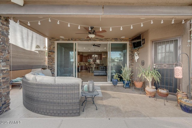 view of patio / terrace featuring outdoor lounge area and ceiling fan