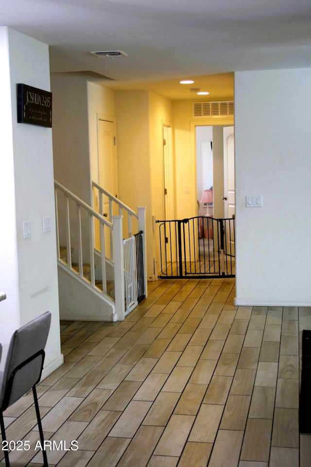 empty room with stairs and visible vents