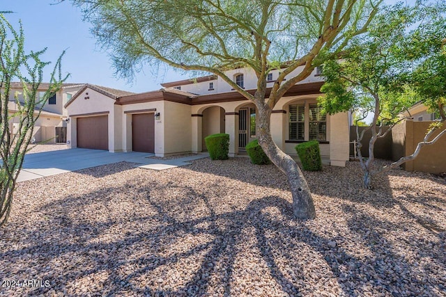 view of front of property featuring a garage